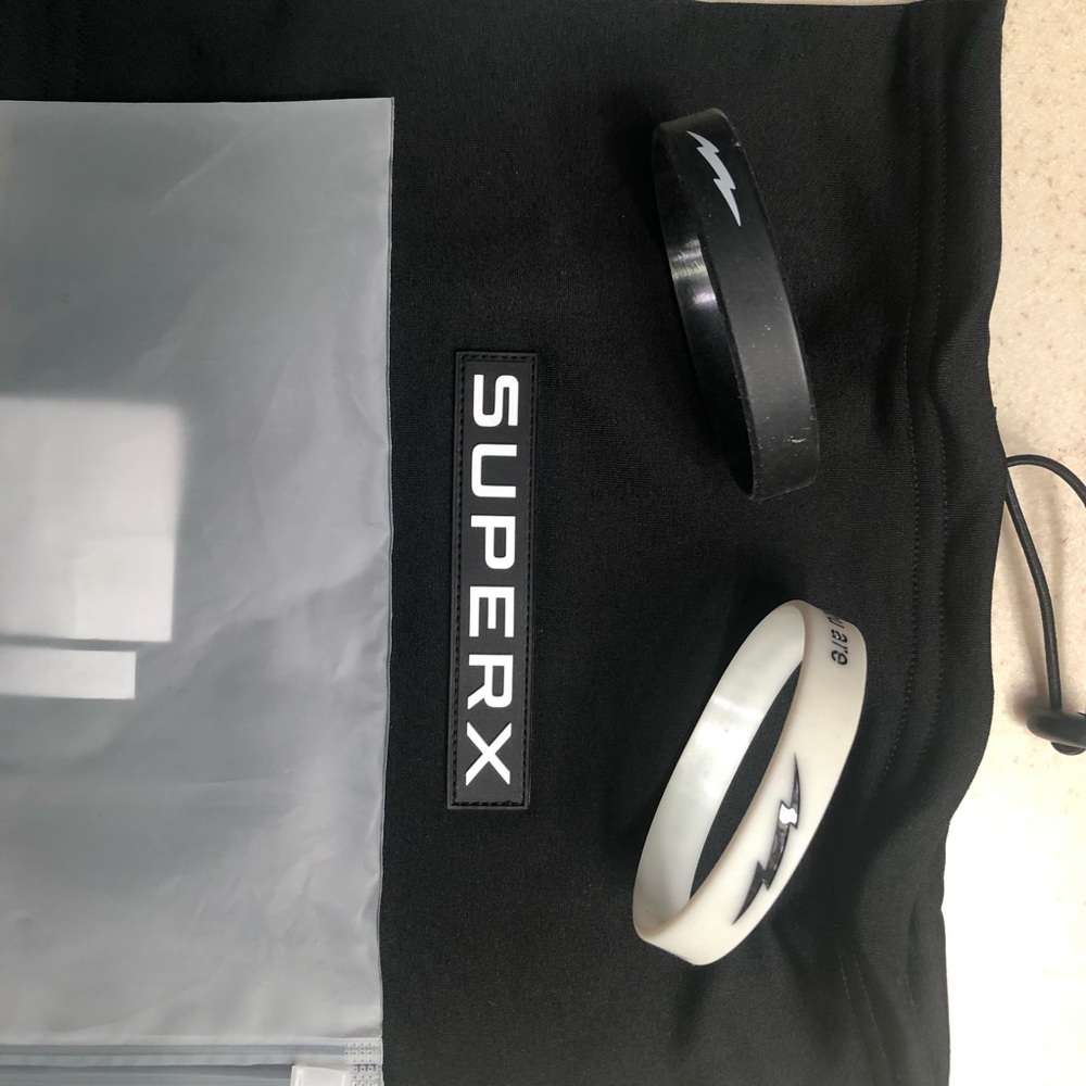 SuperX Apparel face gaiter and two inspirational silicone bracelets.